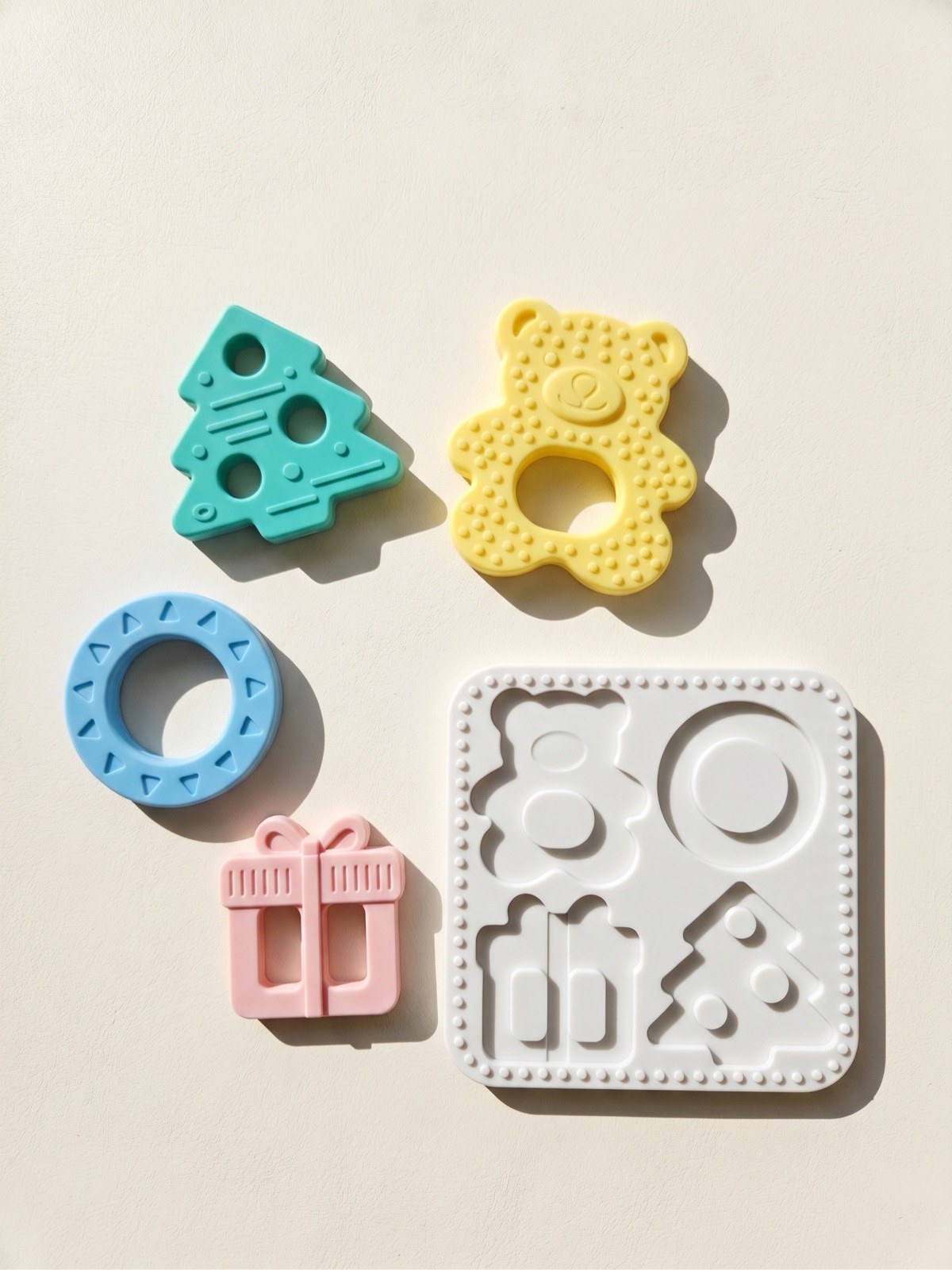 Babylul puzzle board with bear, ring, gift and tree teething pieces
